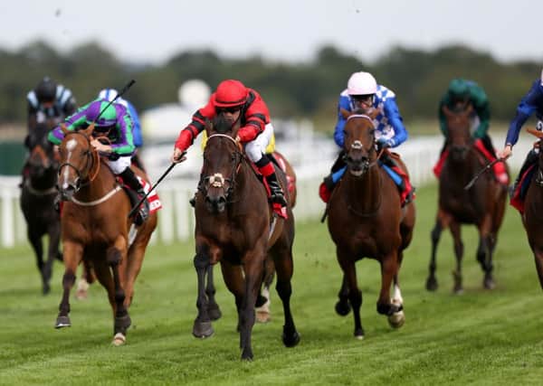 Mullionheir ridden by Kieran Fox (second left) wins the Betfred 'Supposrts Jack Berry House' Ladies Day Handicap Stakes during Betfred Ladies Day at Newbury Racecourse.