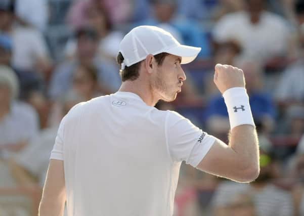 Andy Murray celebrates dueing his Rogers Cup victory over Novak Djokovic.