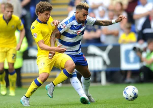 United's Kalvin Phillips gets to grips with Reading's Danny Williams.