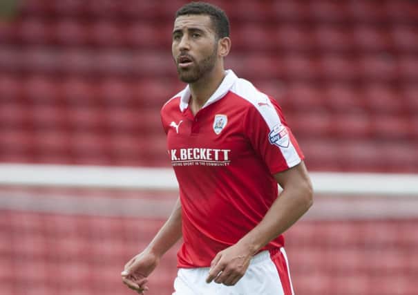 TIMELY INTERVENTION: Barnsley's Lewin Nyatanga. 
Picture: Dean Atkins.