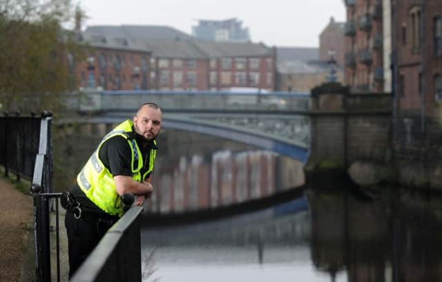 Lee Deighton pictured by Leeds Bridge on the River Aire, Leeds, where he jumped into the river to save a woman who had fallen in.