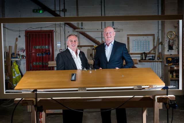 Managing Director of Sentry Doors Gordon Yates, left, with Dave Jones from Reward.