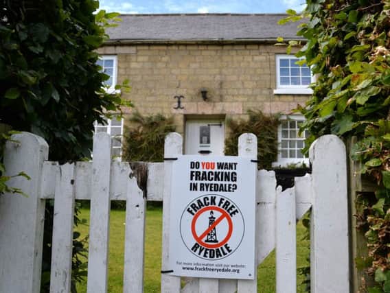 An anti-fracking poster on the garden gate of a house in Kirby Misperton, in Ryedale.( Picture: Anna Gowthorpe).