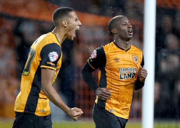 Hull City's Sone Aluko (right) celebrates with team-mate Isaac Hayden.