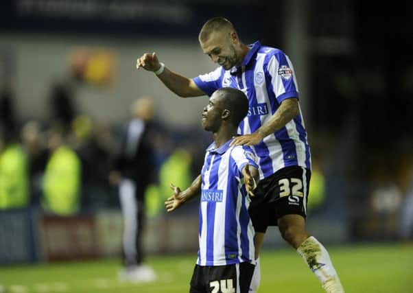 Owls' Modou Sougou hits home late equalising goal and celebrates with Jack Hunt
