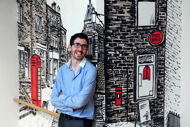 York artist Dan Savage with one of the pieces.
Picture : Jonathan Gawthorpe