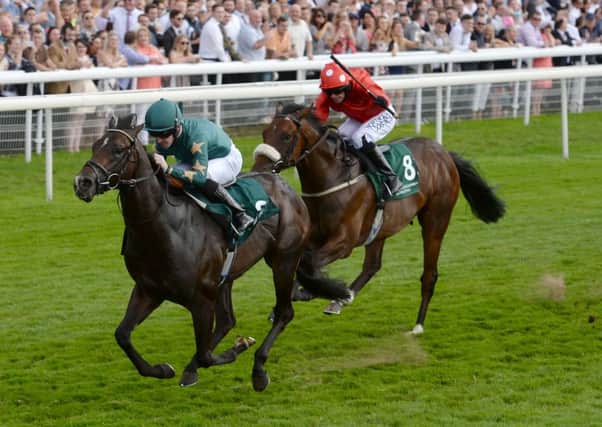 Ajaya, ridden by Graham Gibbons, wins the Irish Thoroughbred Marketing Gimcrack Stakes during day four of the Welcome to Yorkshire Ebor Festival at York (Picture: Anna Gowthorpe/PA Wire).