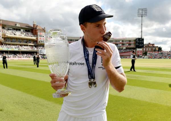 England's Joe Root celebrates their series victory during day four of the Fifth Investec Ashes Test at The Kia Oval, London.
