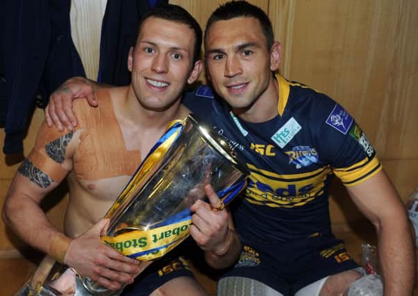 MUTUAL RESPECT: Shaun Lunt, left, and Kevin Sinfield celebrate after Leeds Rhinos Grand Final victory over Warrington. Picture: Steve Riding