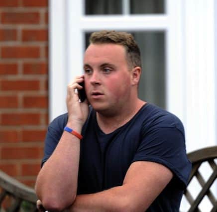 Michael Burton looks at his parents house at the scene of a fatal car crash in Branton, near Doncaster, in which two people have died and a third person is being treated in hospital with life-threatening injuries, after the vehicle crashed into the property and then burst into flames. PRESS ASSOCIATION Photo. Picture date: Tuesday August 25, 2015. See PA story POLICE House. Photo credit should read: John Giles/PA Wire