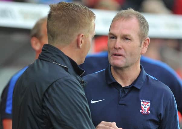 Swansea City manager Garry Monk and York City manager Russ Wilcox during the Capital One Cup, second round match at the Liberty Stadium, Swansea.