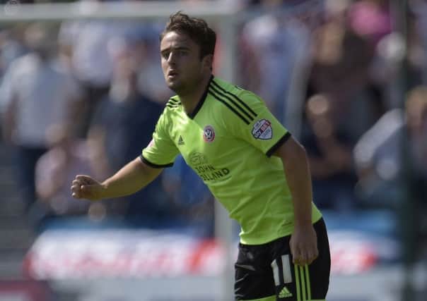 ON YOUR WAY: Sheffield United's Jose Baxter saw red at Fulham.