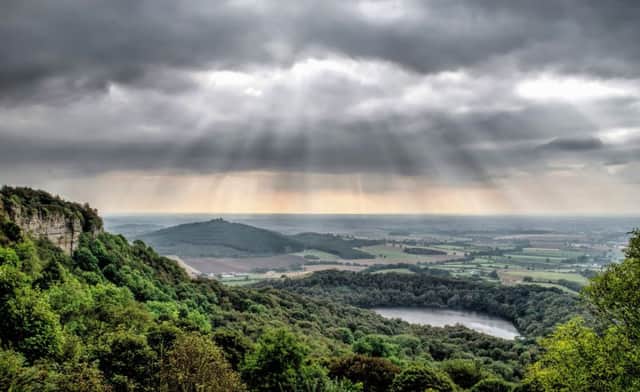 Gloomy skies and rain clouds over Sutton Bank, North Yorkshire.