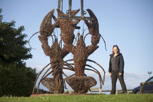 Emma Stothard with her lobster sculptures ahead of the Staithes Festival of Arts and Heritage.