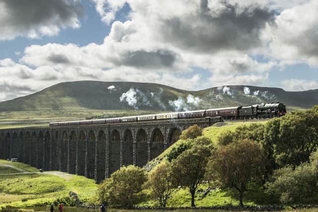 ©Andrew McCaren/AM images
26/08/2015, Ribblehead, UK. Picture shows the Fellsman steam train 46115 making it's final crossing for the season of the Ribblehead Viaduct in the Yorkshire Dales. Photo credit: Andrew Mccaren/AM images