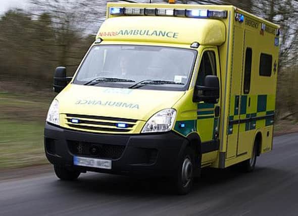 Unique ID: REFR0292

Caption: Ambulance response to a 999 emergency call. Rapid response emergency service healthcare. A vehicle with flashing lights painted yellow travelling along a road. 

Restrictions: NHS Photo Library - for use in NHS, local authority Social Care services and Department of Health material only

Copyright: ©Crown Copyright