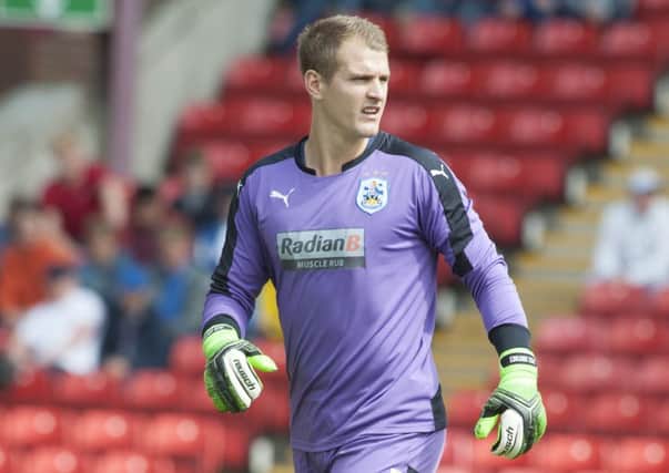ON WAY BACK: Goalkeeper Alex Smithies is back at the John Smiths Stadium just nine days after making a £1.5m move to Queens Park Rangers.