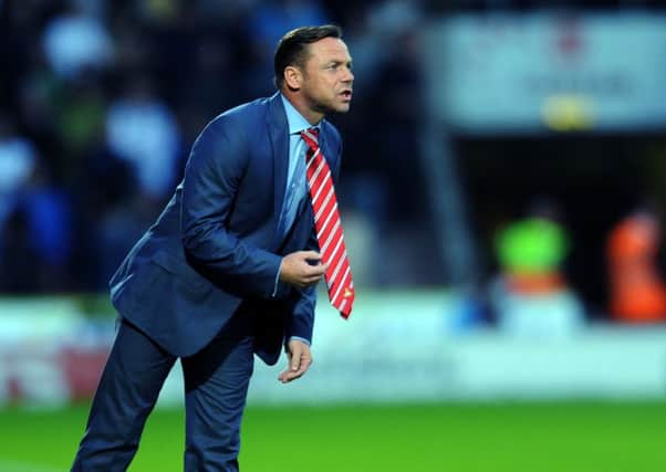 Rovers manager Paul Dickov.