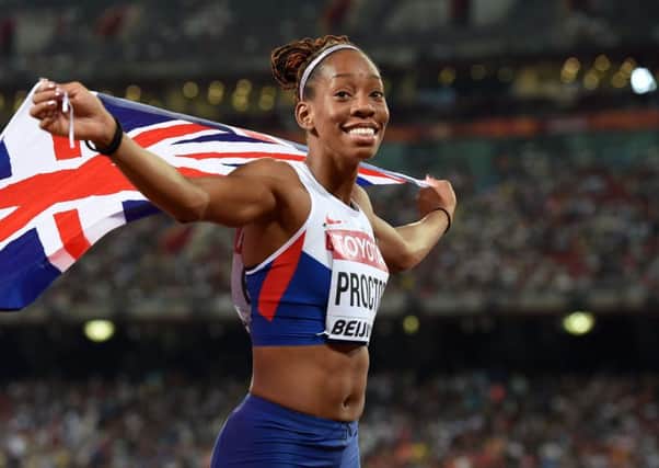 Great Britain's Shara Proctor celebrates after winning the silver medal in the women's long jump.