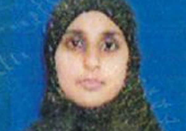 A photo issued by the Metropolitan Police of Zahera Tariq, 33, who is feared to be travelling to war-torn Syria with her four children.