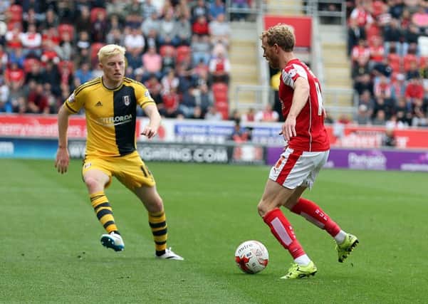 Rotherham's Paul Green faces up to his old team mate, Fulham's Ben Pringle (Picture: James Brailsford)