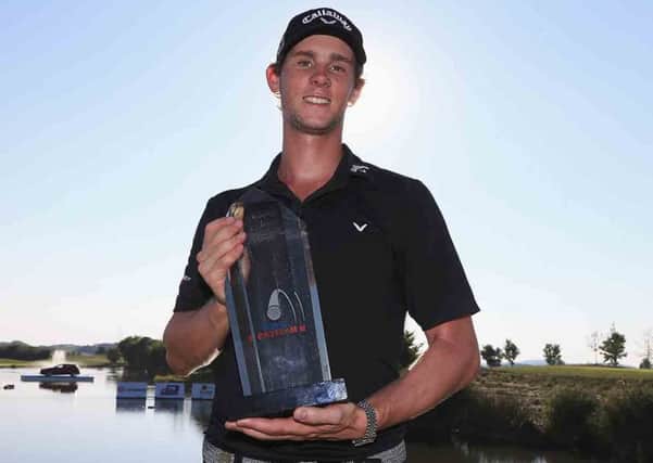 Belgium Thomas Pieters with the trophy after winning the D+D Real Czech Masters at the Albatross Golf Resort (Picture: Matthew Lewis/Getty Images).