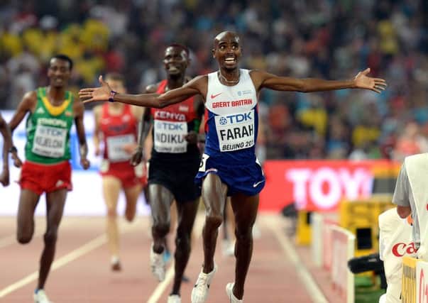 Great Britain's Mo Farah wins the Men's 5000m Final during day eight of the IAAF World Championships at the Beijing National Stadium, China. (Picture Martin Rickett/PA Wire).