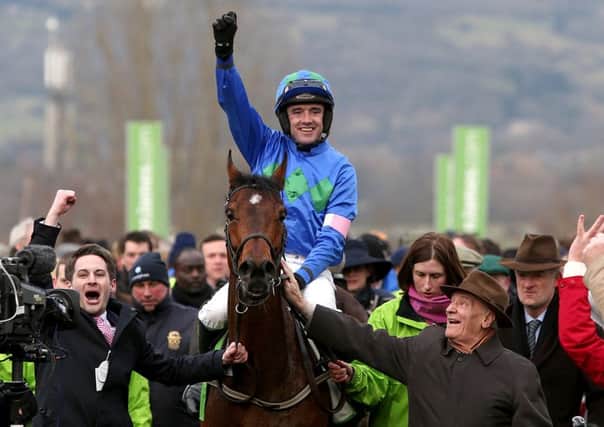 Hurricane Fly ridden by jockey Ruby Walsh after winning the Stan James Champion Hurdle at the 2013 Cheltenham Festival in 2013. Picture: David Davies/PA.