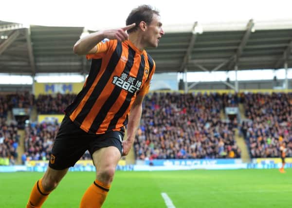 Nikica Jelavic is leaving Hull City to move back to the Premier League with West Ham.