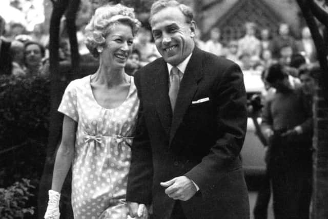Billy Wright with Joy Beverley following their wedding at Poole Register Office.