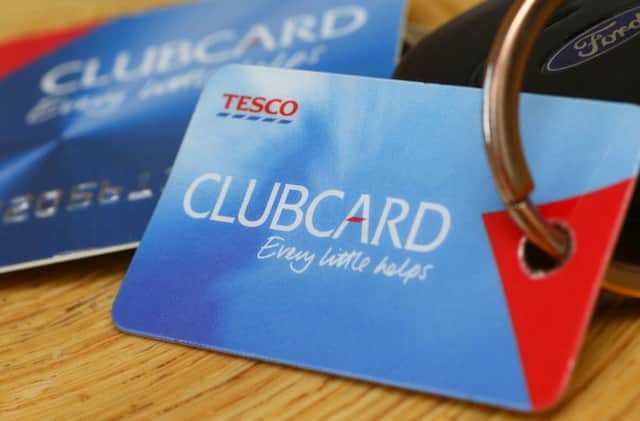 Tesco Clubcards will be debited with fewer points by the supermarket chain from December