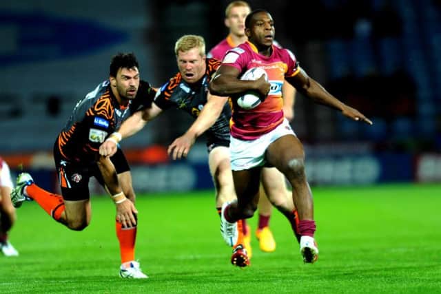 Huddersfield's Jermaine McGillvary makes a break in Thursday night's clash at home to Castleford.
 Picture: Jonathan Gawthorpe.