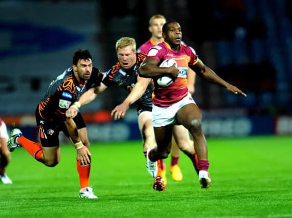 Huddersfield's Jermaine McGillvary makes a break in Thursday night's clash at home to Castleford.
 Picture: Jonathan Gawthorpe.
