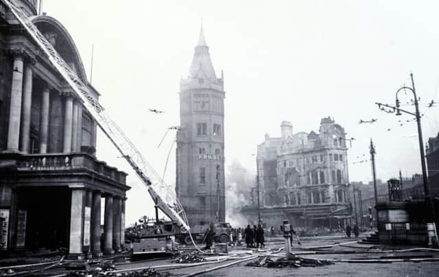 Bomb damage to Hull's Victoria Square, showing the Prudential Building
