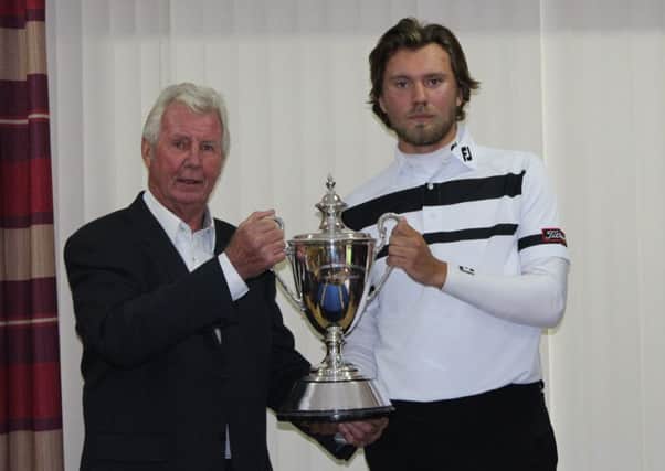 Darrell Burrows (The Needless Inn) present the Yorkshire Open trophy to Dan Brown.