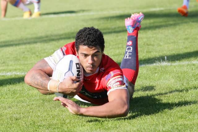 Kieran Dixon dives over for Hull KR's second try. Picture: dlphotos.com