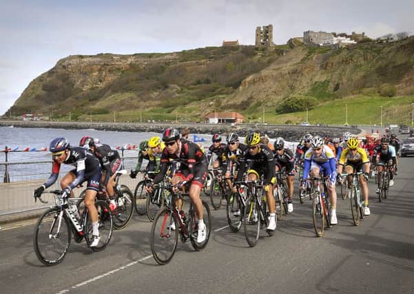 The cyclists ride to the finish at Scarborough's North Bay during the Tour de Yorkshire 2015.
Picture: Richard Ponter