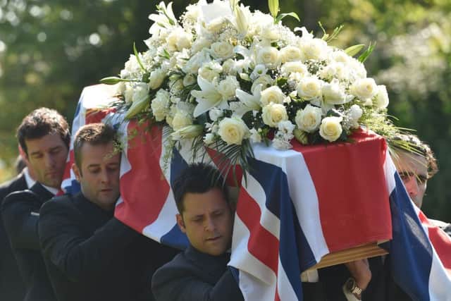 The funeral of Indycar racer Justin Wilson took place at St James the Great Church in Paulerspury, Northamptonshire.