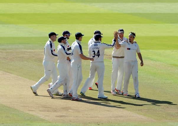 Yorkshire, including captain Andrew Gale, second right, celebrate the wicket of Middlesex's Neil Dexter. Picture: Tony Johnson