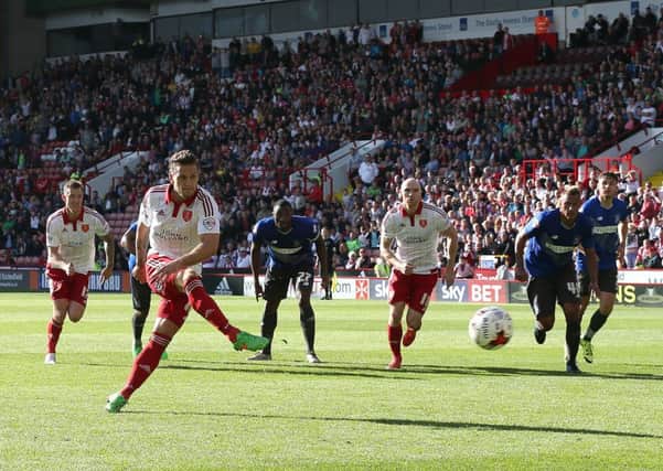 Billy Sharp scores from the penalty spot.