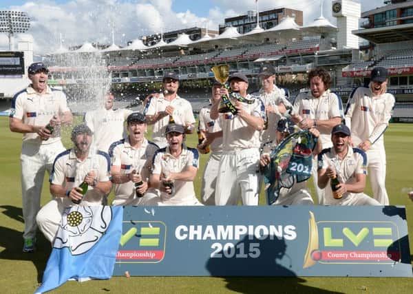 PARTY TIME: Yorkshire's players pop the Champagne corks to celebrate retaining the County championship title. Picture: PA.