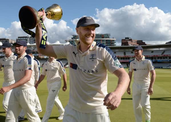 Yorkshire captain Andrew Gale lifts the County Championship trophy at Lord's.