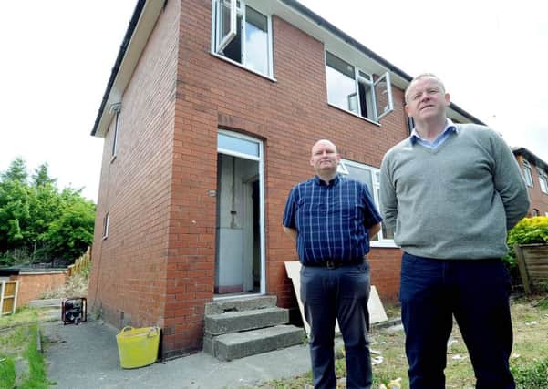 The Hunslet Club, Leeds, refurbishing a propertyin Beeston, Leeds. Pictured (left to right) Danny Dickinson, from Gipsil based in Leeds, and Dennis Robins, CEO of the Hunslet Club.