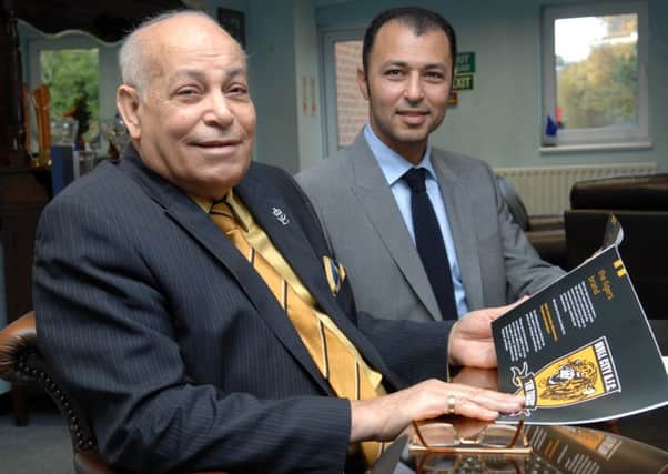 Owners of Hull City AFC Assem Allam and his son, Ehab.