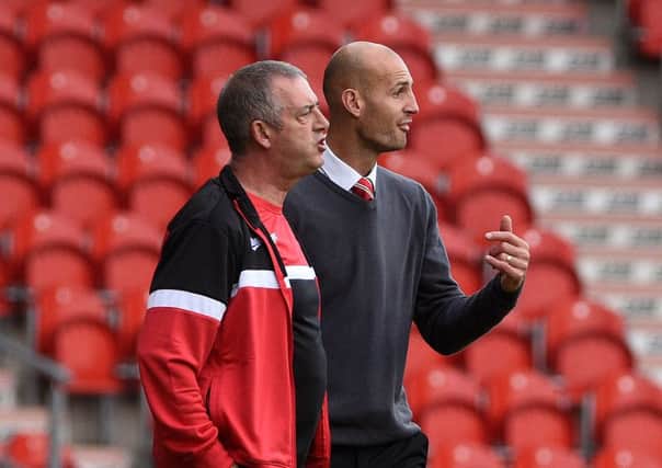 Doncaster Rovers' caretaker manager Rob Jones and youth coach Paul Stanicliffe direct operations in the League One game against Oldham Athletic (Picture: Andrew Roe).