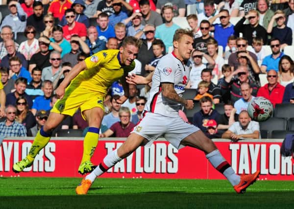 Charlie Taylor fires in Leeds' second goal past Kyle McFadzean