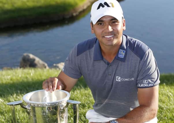 Australia's Jason Day after his BMW Championship Trophy win (Picture: Charles Rex Arbogast/AP).