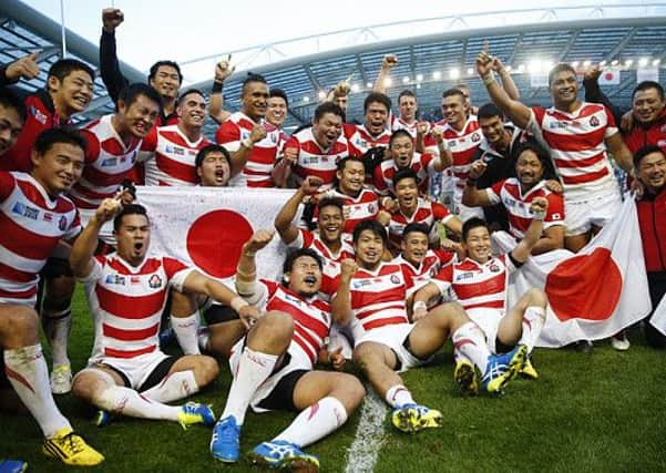 Japan celebrate victory over South Africa in one of the biggest upsets in Rugby World Cup history. (Picture: Reuters / Eddie Keogh
)
