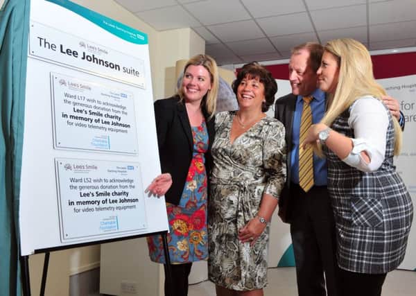 Dr Melissa Maguire, consultant neurologist, with Vicky, Simon and Becky Johnson at Leeds General Infirmary. Picture by Tony Johnson.