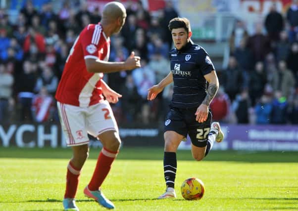 Alex Mowatt battles with Emilio Nsue during last year's meeting between Middlesbrough and Leeds United at Riverside Stadium. The two meet again this Sunday. Picture Bruce Rollinson